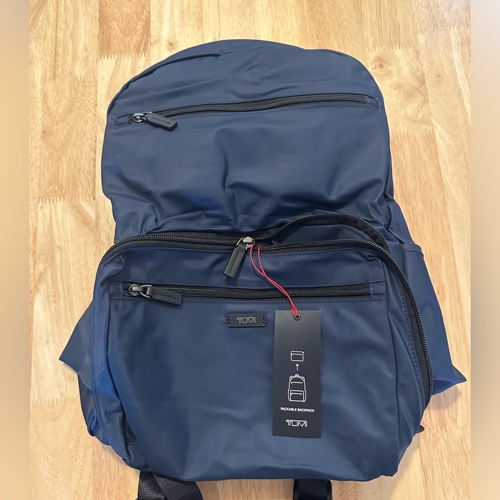 Tumi backpack, navy, never used